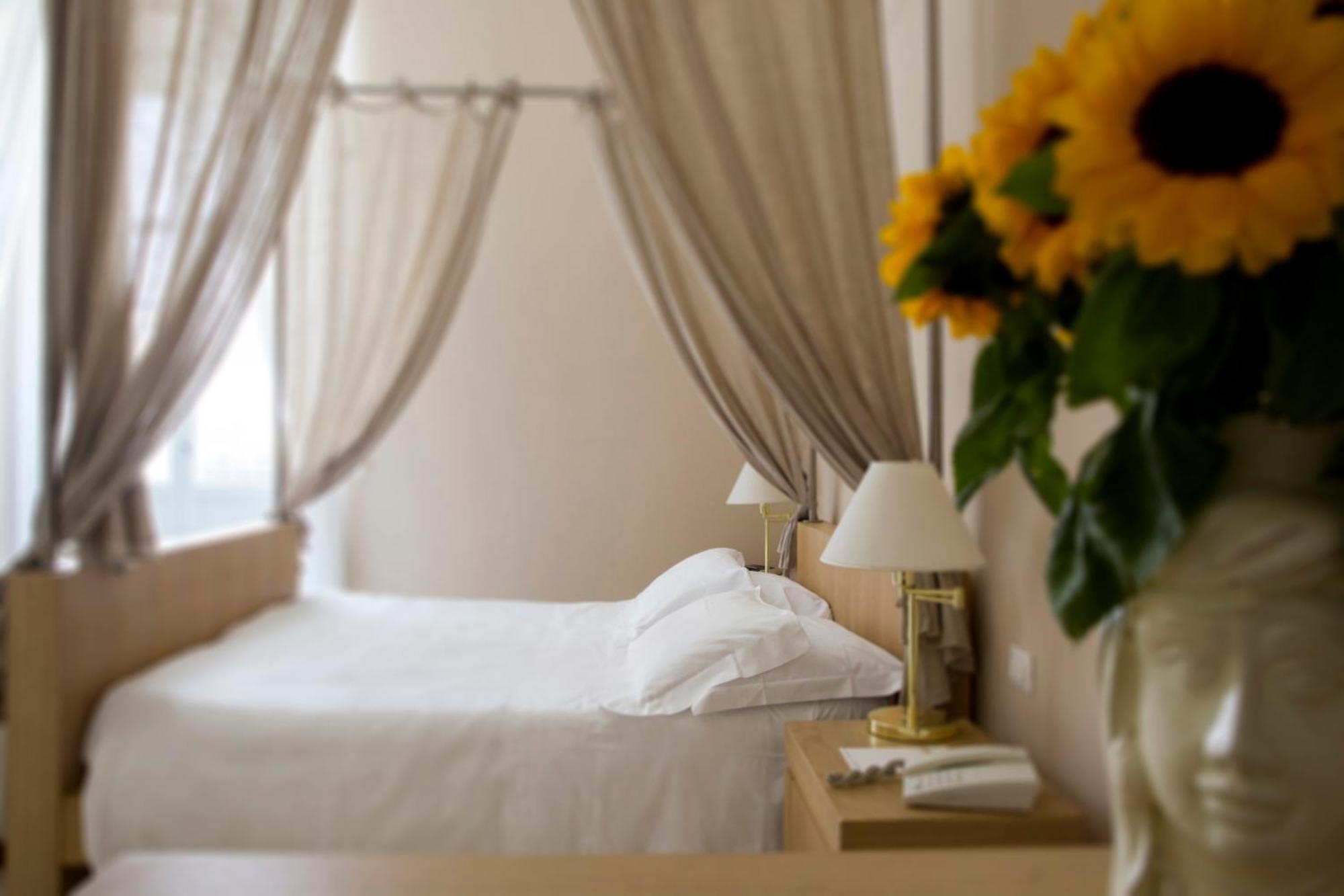Superior room a four poster bed