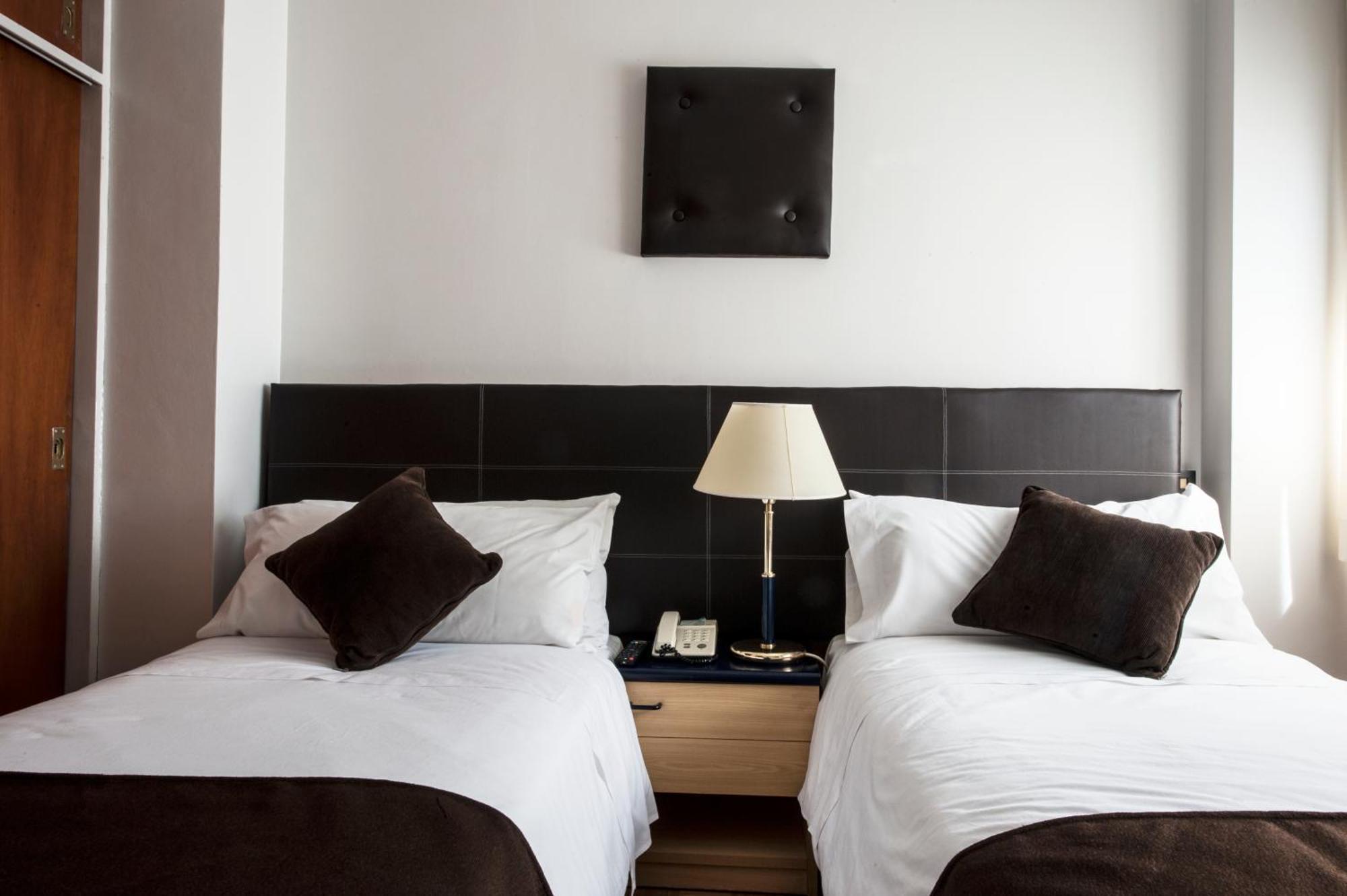 Tweepersoonskamer met 2 Aparte Bedden