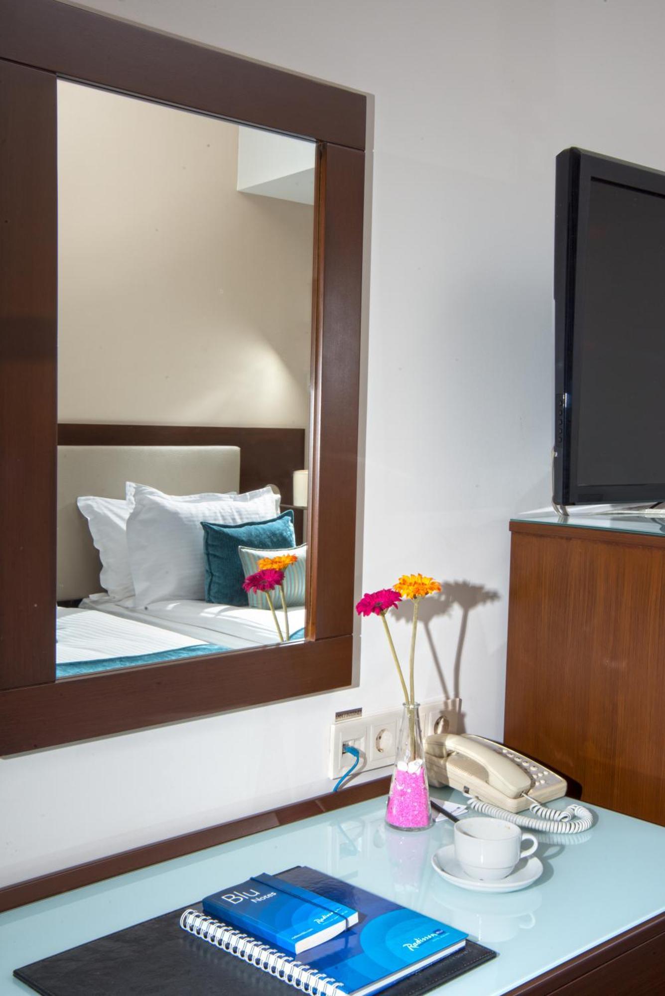Quarto Superior com Varanda e Vista da Cidade