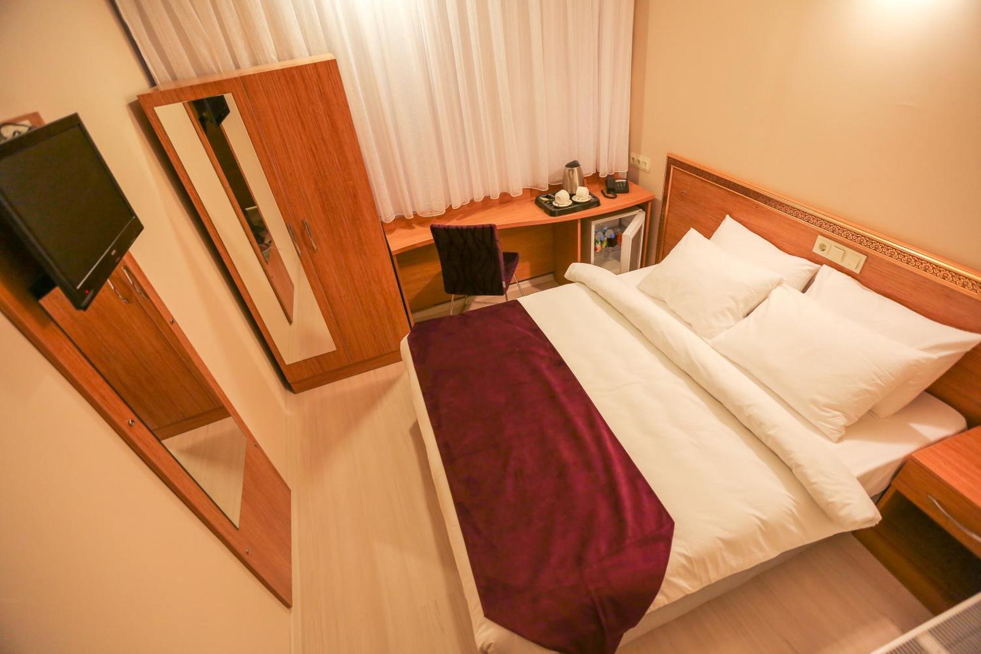 Deluxe Single Room,709621288:JPEG