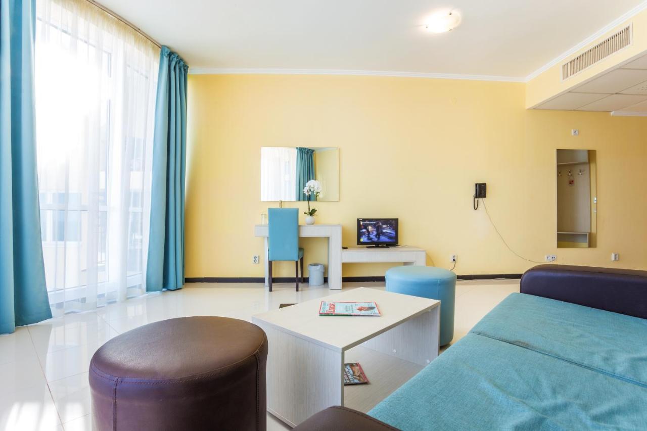 Suite de 1 dormitorio con balcón (2 adultos y 2 niños)