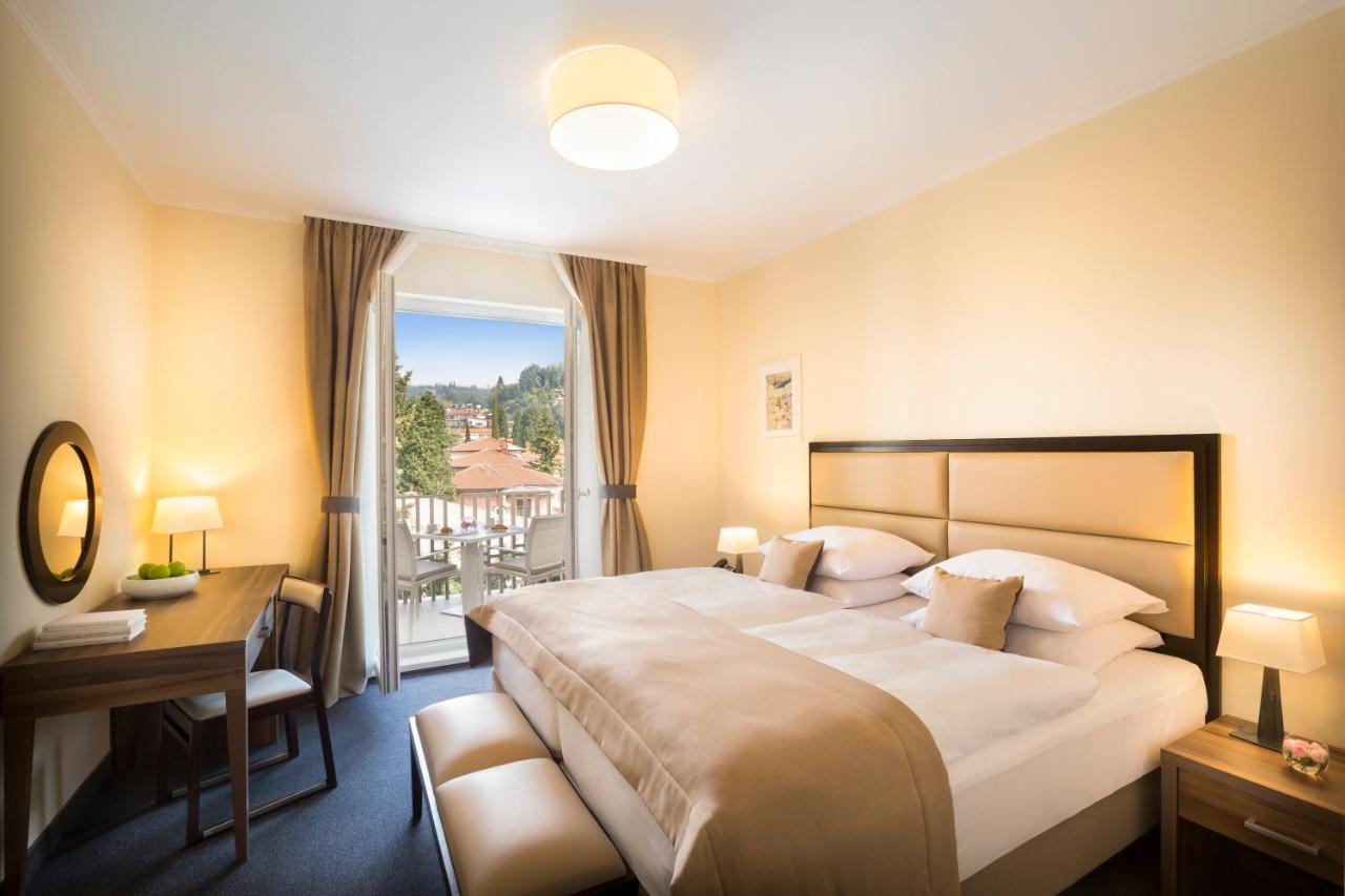 Standard Zweibettzimmer mit Balkon und Parkblick