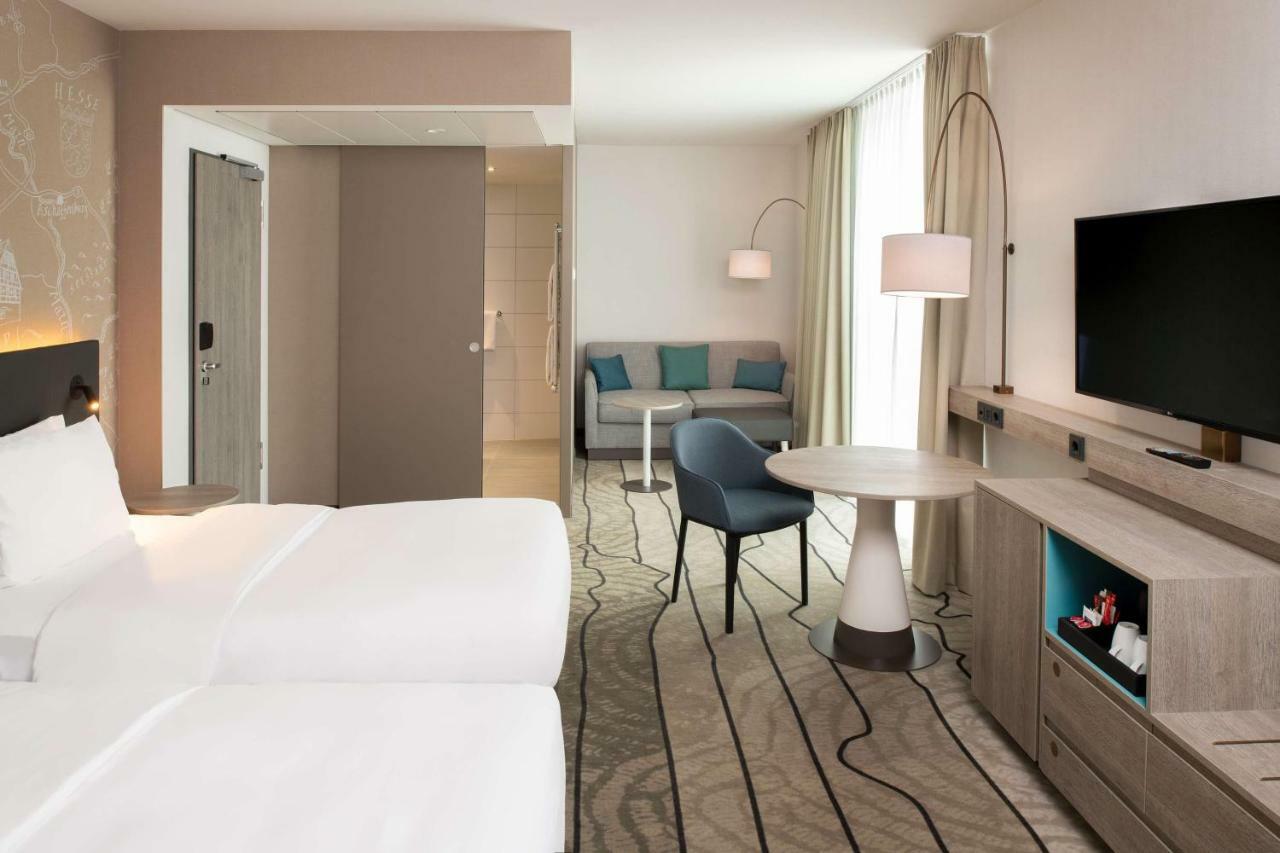 Habitación Estándar con 2 camas individuales y sofá cama