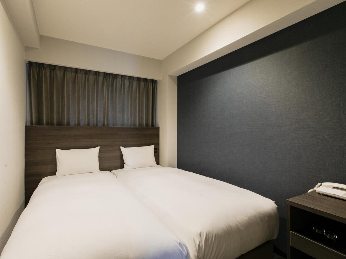 Quarto com 2 Camas de Solteiro Hollywood - Não Fumantes
