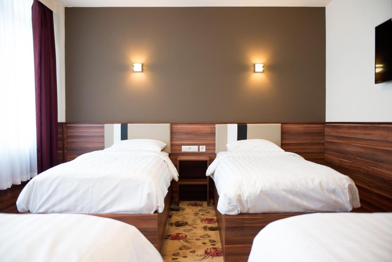 Chambre Quadruple avec Salle de Bains Privative